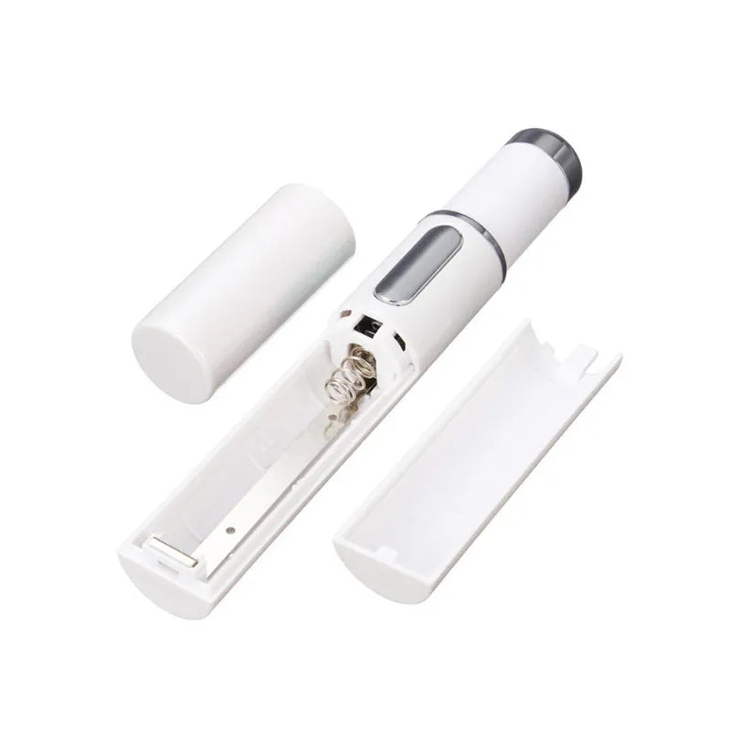 ClearifySkin Blue Light Acne Pen Treatment device with open battery compartment showing internal components and easy battery installation - portable design for convenient use
